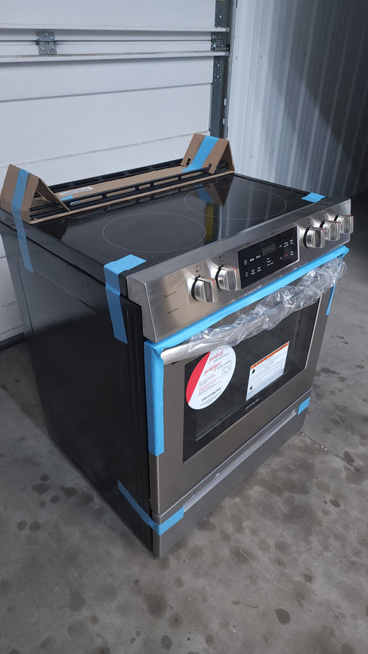 Frigidaire  30-in Smooth Surface 5 Elements 5-cu ft Self-Cleaning Freestanding Electric Range (Easycare Stainless Steel)!

-Brand new, has one very small indent on the bottom left side, photos shown