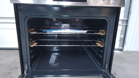 Frigidaire  30-in Smooth Surface 5 Elements 5-cu ft Self-Cleaning Freestanding Electric Range (Easycare Stainless Steel)!

-Brand new, has one very small indent on the bottom left side, photos shown