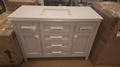 Riverdale 48 in. W x 21 in. D Vanity in Dove Grey with a Cultured Marble Vanity Top in White with White Sink! 

-Brand new out of the box ( Top of Vanity is Cracked - Photos shown - Price reduced for the crack)