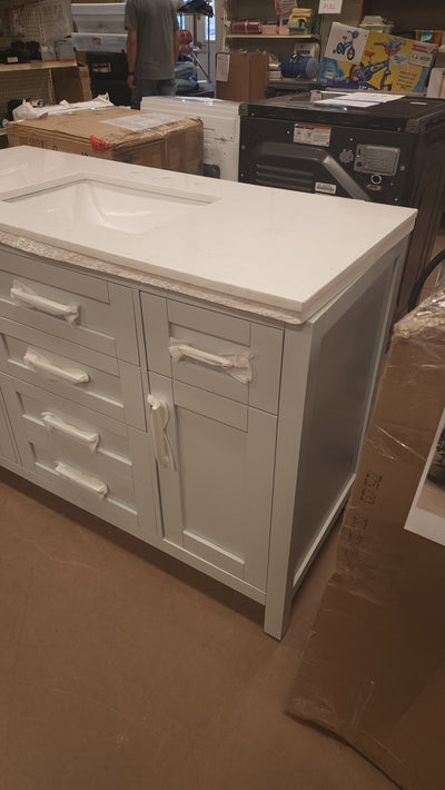 Riverdale 48 in. W x 21 in. D Vanity in Dove Grey with a Cultured Marble Vanity Top in White with White Sink! 

-Brand new out of the box ( Top of Vanity is Cracked - Photos shown - Price reduced for the crack)