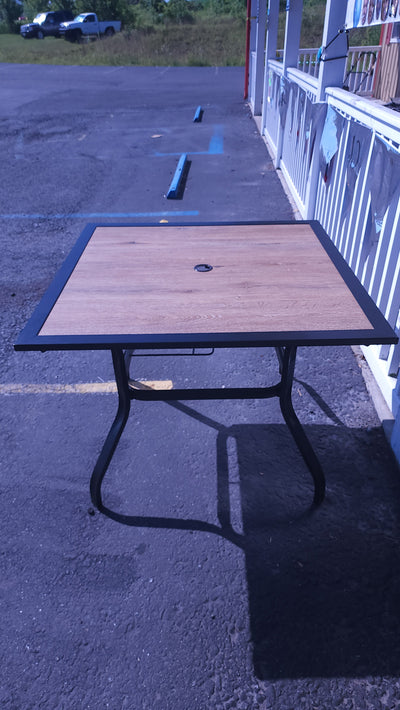 Black Square Metal Patio Outdoor Dining Table with 1.57" Umbrella Hole and Wood-Look Tabletop! (OUTDOOR TABLE SPECIAL!)

-New assembled out of the box but the wood top is cracked, photos shown