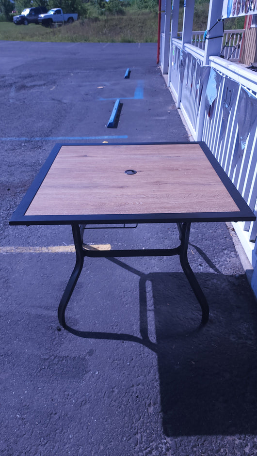 Black Square Metal Patio Outdoor Dining Table with 1.57" Umbrella Hole and Wood-Look Tabletop! (OUTDOOR TABLE SPECIAL!)

-New assembled out of the box but the wood top is cracked, photos shown