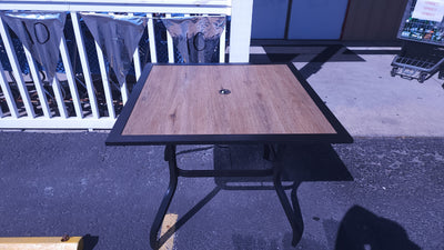 Black Square Metal Patio Outdoor Dining Table with 1.57" Umbrella Hole and Wood-Look Tabletop! (OUTDOOR TABLE SPECIAL!)

-New assembled out of the box but the wood top is cracked, photos shown