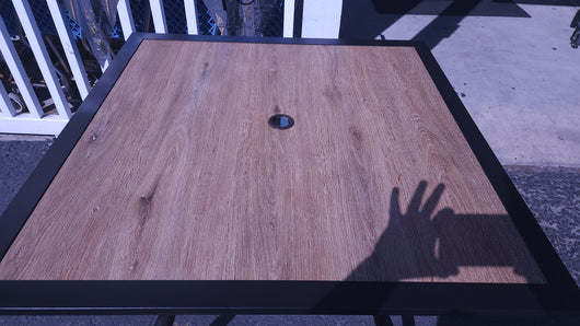 Black Square Metal Patio Outdoor Dining Table with 1.57" Umbrella Hole and Wood-Look Tabletop! (OUTDOOR TABLE SPECIAL!)

-New assembled out of the box but the wood top is cracked, photos shown