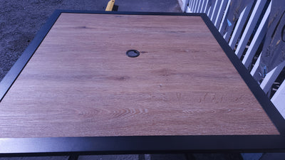 Black Square Metal Patio Outdoor Dining Table with 1.57" Umbrella Hole and Wood-Look Tabletop! (OUTDOOR TABLE SPECIAL!)

-New assembled out of the box but the wood top is cracked, photos shown