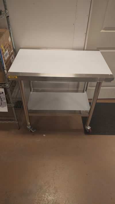 VEVOR Stainless Steel Work Table 36x24 Inch Food Prep Station!

-Brand new and assembled but does have one small indent on the bottom shelf, photos shown