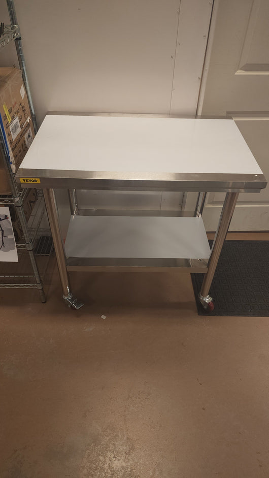 VEVOR Stainless Steel Work Table 36x24 Inch Food Prep Station!

-Brand new and assembled but does have one small indent on the bottom shelf, photos shown