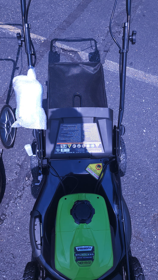 Greenworks 40V 21-inch Brushless Self-Propelled Lawn Mower W/5.0 Ah Battery & Charger! (NEW)

-Brand new, but is missing the Mulcher & side discharge attatments, photos shown!
