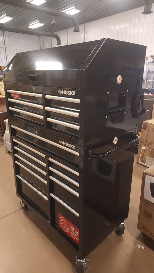Husky 41 in. W x 24.5 in D Standard Duty 16-Drawer Combination Rolling Tool Chest and Top Tool Cabinet Set in Gloss Black!

-Brand new out of the box, does have one very small indent on the back left corner, photos shown