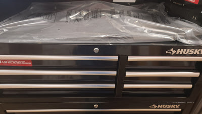 Husky 41 in. W x 24.5 in D Standard Duty 16-Drawer Combination Rolling Tool Chest and Top Tool Cabinet Set in Gloss Black!

-Brand new out of the box, does have one very small indent on the back left corner, photos shown