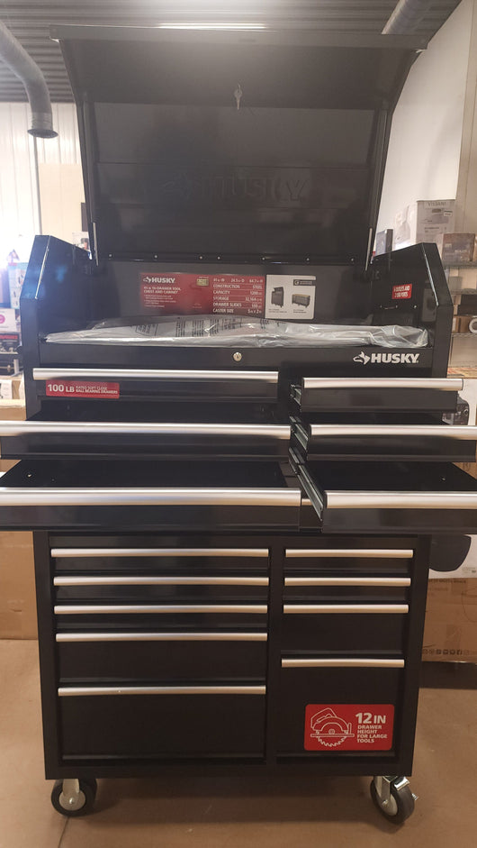 Husky 41 in. W x 24.5 in D Standard Duty 16-Drawer Combination Rolling Tool Chest and Top Tool Cabinet Set in Gloss Black!

-Brand new out of the box, does have one very small indent on the back left corner, photos shown
