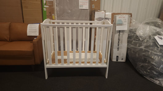 White Foldable Crib! (NEW - SCRATCHED FROM SHIPPING)

-Brand new never used, does have some light scratches 