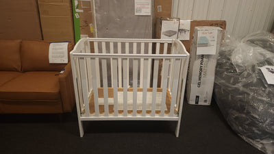 White Foldable Crib! (NEW - SCRATCHED FROM SHIPPING)

-Brand new never used, does have some light scratches 
