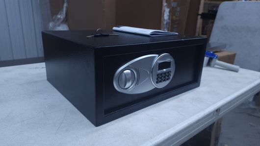 AmazonBasics Steel, Security Safe Lock Box, Black - 0.7-Cubic Feet!

-Brand new out of the box, does have a very small chip from shipping, photos shown
