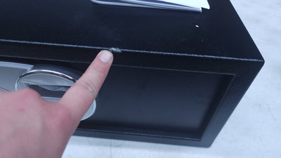 AmazonBasics Steel, Security Safe Lock Box, Black - 0.7-Cubic Feet!

-Brand new out of the box, does have a very small chip from shipping, photos shown