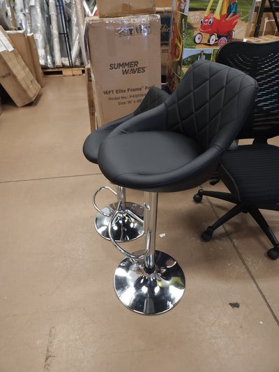 Set of 2 Faux Leather Adjustable Stools, Black!

-Brand new and Assembled, but one stool has a very small tear, photos shown
