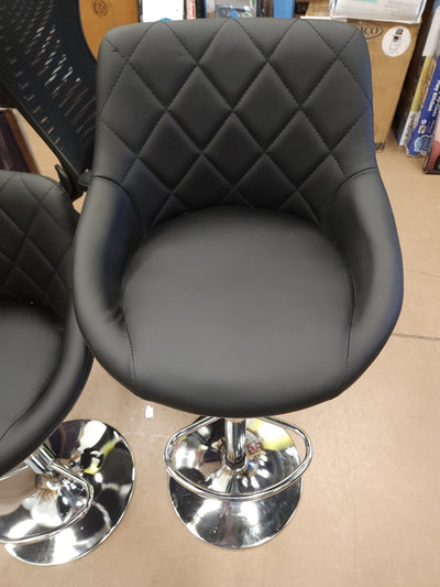 Set of 2 Faux Leather Adjustable Stools, Black!

-Brand new and Assembled, but one stool has a very small tear, photos shown