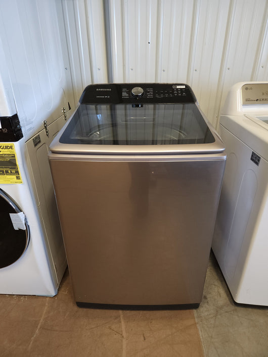 Samsung 5.0 cu. ft. Top Load Washer with Active Water Jet in Champagne!  -Brand new out of the box, but does have a small indent from shipping, photos shown