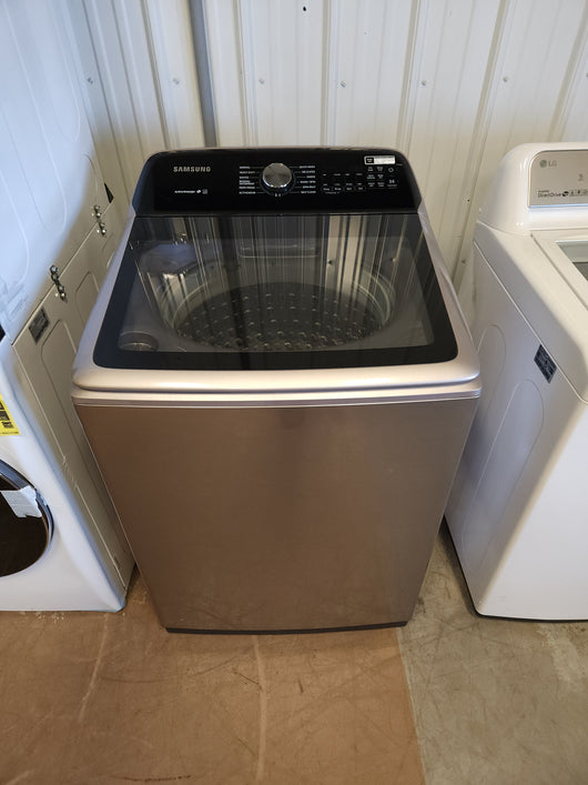 Samsung 5.0 cu. ft. Top Load Washer with Active Water Jet in Champagne!  -Brand new out of the box, but does have a small indent from shipping, photos shown