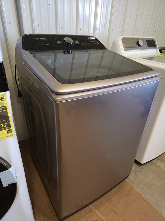Samsung 5.0 cu. ft. Top Load Washer with Active Water Jet in Champagne!  -Brand new out of the box, but does have a small indent from shipping, photos shown