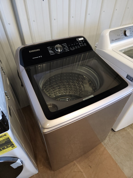Samsung 5.0 cu. ft. Top Load Washer with Active Water Jet in Champagne!  -Brand new out of the box, but does have a small indent from shipping, photos shown