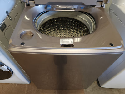 Samsung 5.0 cu. ft. Top Load Washer with Active Water Jet in Champagne!  -Brand new out of the box, but does have a small indent from shipping, photos shown