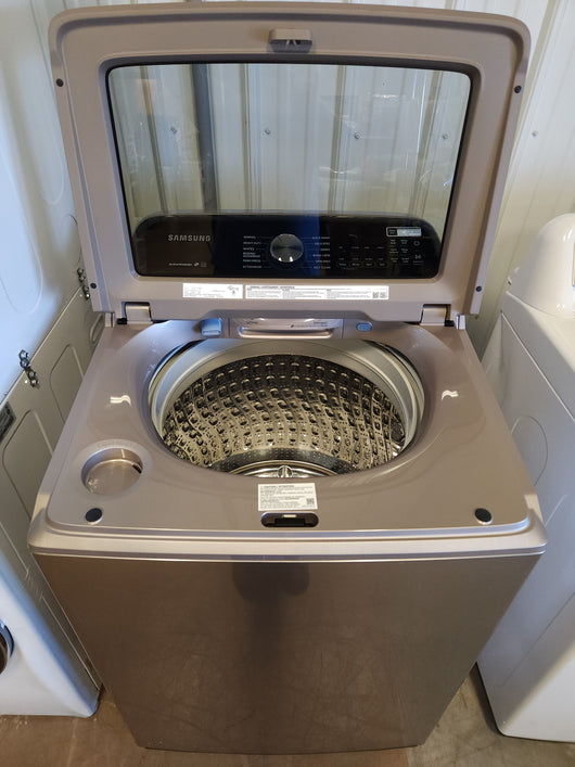 Samsung 5.0 cu. ft. Top Load Washer with Active Water Jet in Champagne!  -Brand new out of the box, but does have a small indent from shipping, photos shown
