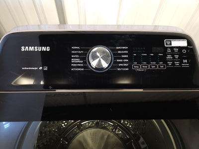 Samsung 5.0 cu. ft. Top Load Washer with Active Water Jet in Champagne!  -Brand new out of the box, but does have a small indent from shipping, photos shown