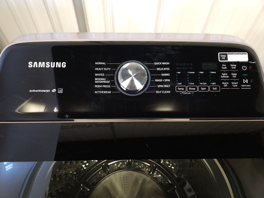 Samsung 5.0 cu. ft. Top Load Washer with Active Water Jet in Champagne!  -Brand new out of the box, but does have a small indent from shipping, photos shown