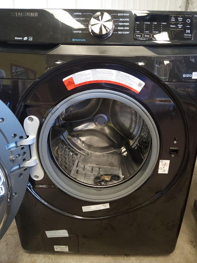 Samsung 4.5CuFt Front Load Washer with Steam!

-Brand new out of the box (Does Have a small indent under the door) - (Works perfectly, door must be pushed harder to close, Does Lock When Started)