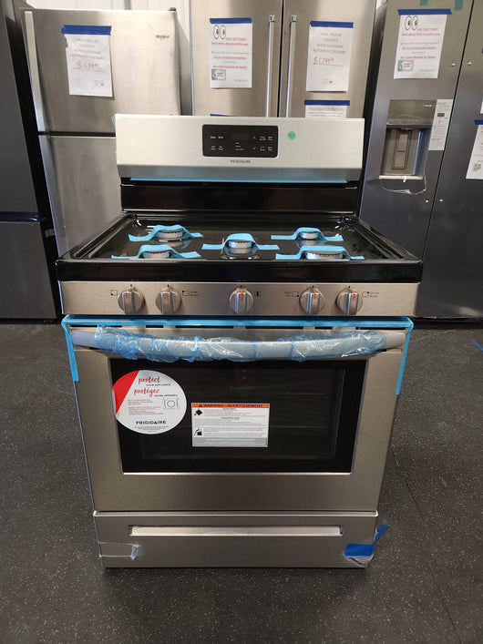 Frigidaire  30-in 5 Burners 5-cu ft Self-cleaning Freestanding Gas Range (Easycare Stainless Steel)!

-Brand new out of the box but is lightly dented from shipping, photos shown