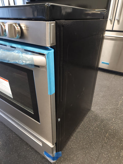Frigidaire  30-in 5 Burners 5-cu ft Self-cleaning Freestanding Gas Range (Easycare Stainless Steel)!

-Brand new out of the box but is lightly dented from shipping, photos shown