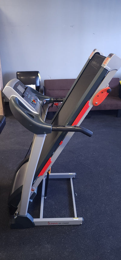 Sunny Health & Fitness Treadmill with Manual Incline, Pulse Sensors, Folding, LCD Monitor for Exercise SF-T4400! 

-New & Assembled but does have some cracked plastics from shipping, photos shown