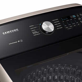 Samsung 5.0 cu. ft. Top Load Washer with Active Water Jet in Champagne!  -Brand new out of the box, but does have a small indent from shipping, photos shown