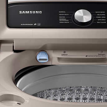 Samsung 5.0 cu. ft. Top Load Washer with Active Water Jet in Champagne!  -Brand new out of the box, but does have a small indent from shipping, photos shown
