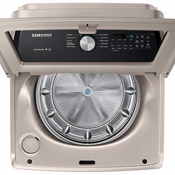 Samsung 5.0 cu. ft. Top Load Washer with Active Water Jet in Champagne!  -Brand new out of the box, but does have a small indent from shipping, photos shown