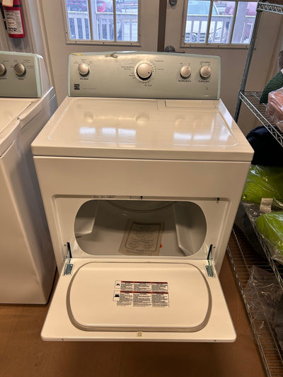 Kenmore Front Load Electric Dryer with Wrinkle Guard and 7.0 Cubic Ft. Total Capacity, White!  -Brand new never used but is dented from shipping, photos shown. (Front left edge is tape over to keep closed)