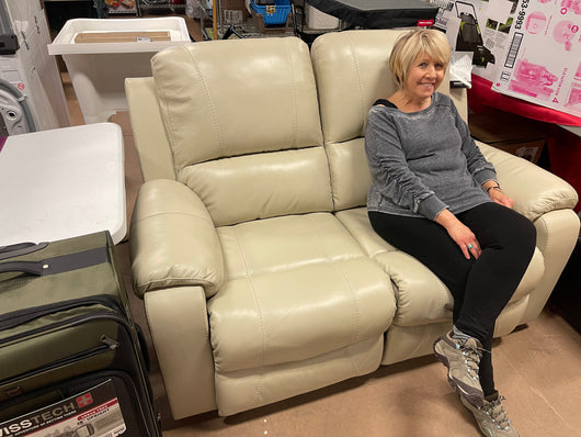 Signature Design by Ashley Rackingburg Leather Adjustable Dual Sided Power Reclining Loveseat, Cream- brand new