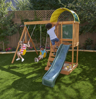 KidKraft Ainsley Wooden Outdoor Swing Set with Slide, Chalk Wall, Canopy and Rock Wall**New in Box**