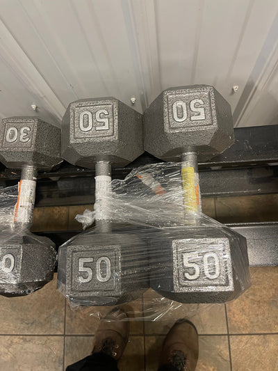 Pair of 50 pound iron hex dumbbells- new