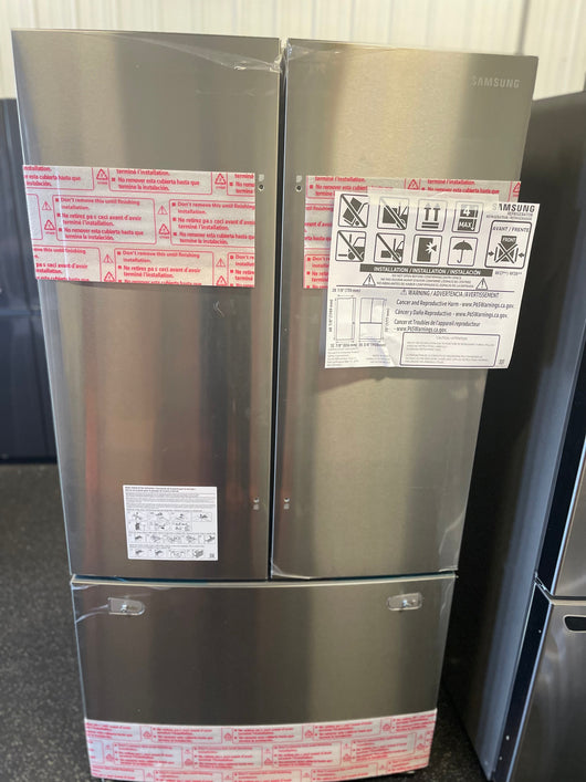 Samsung 28 cu. ft. Large Capacity 3-Door French Door Refrigerator (brand new still in plastic. Minor dent on the side- photos shown)