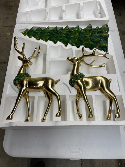 2 skillfully sculpted gold deer and a festive green tree that have been hand-painted - new in box
