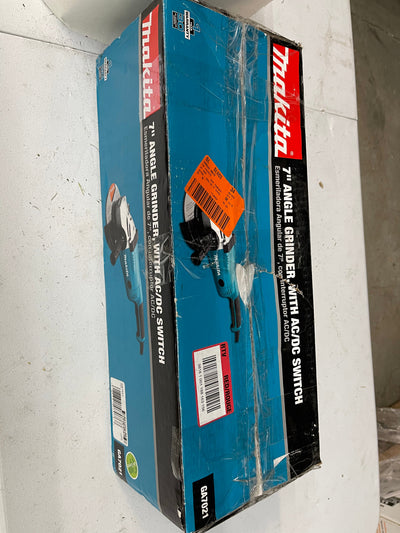 Makita 15 Amp 7 in. Corded Angle Grinder with Grinding wheel, Side handle and Wheel Guard  slightly used - great condition