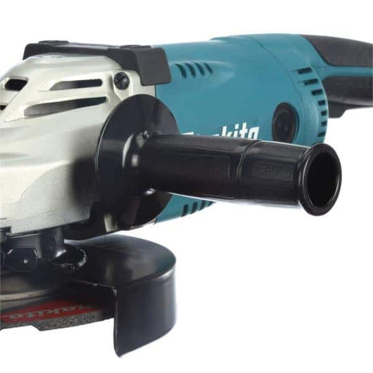 Makita 15 Amp 7 in. Corded Angle Grinder with Grinding wheel, Side handle and Wheel Guard  slightly used - great condition
