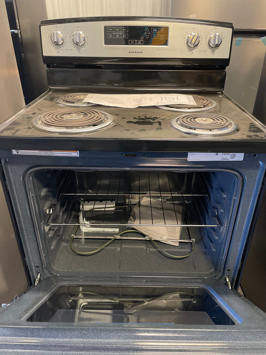 Amana stove 30-in 4 Elements 4.8-cu ft Freestanding Electric Range (Stainless Steel) brand new - not a return - scratch and dent unit- minor shipping damages