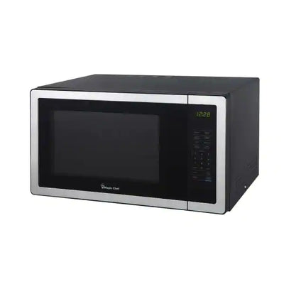 Magic Chef 1.1 cu. ft. Countertop Microwave in Stainless Steel with Gray Cavity**New,cracked ring but works completely fine**