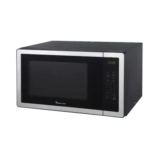 Magic Chef 1.1 cu. ft. Countertop Microwave in Stainless Steel with Gray Cavity**New,cracked ring but works completely fine**