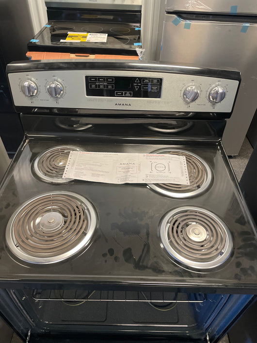 Amana stove 30-in 4 Elements 4.8-cu ft Freestanding Electric Range (Stainless Steel) brand new - not a return - scratch and dent unit- minor shipping damages
