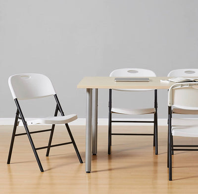 Amazon Basics Folding Plastic Chair, 350-Pound Capacity, White, 4-Pack- NEW IN BOX!!!
