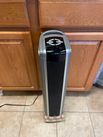 Lasko oscillating ceramic tower heater (very lightly used. Tested works)